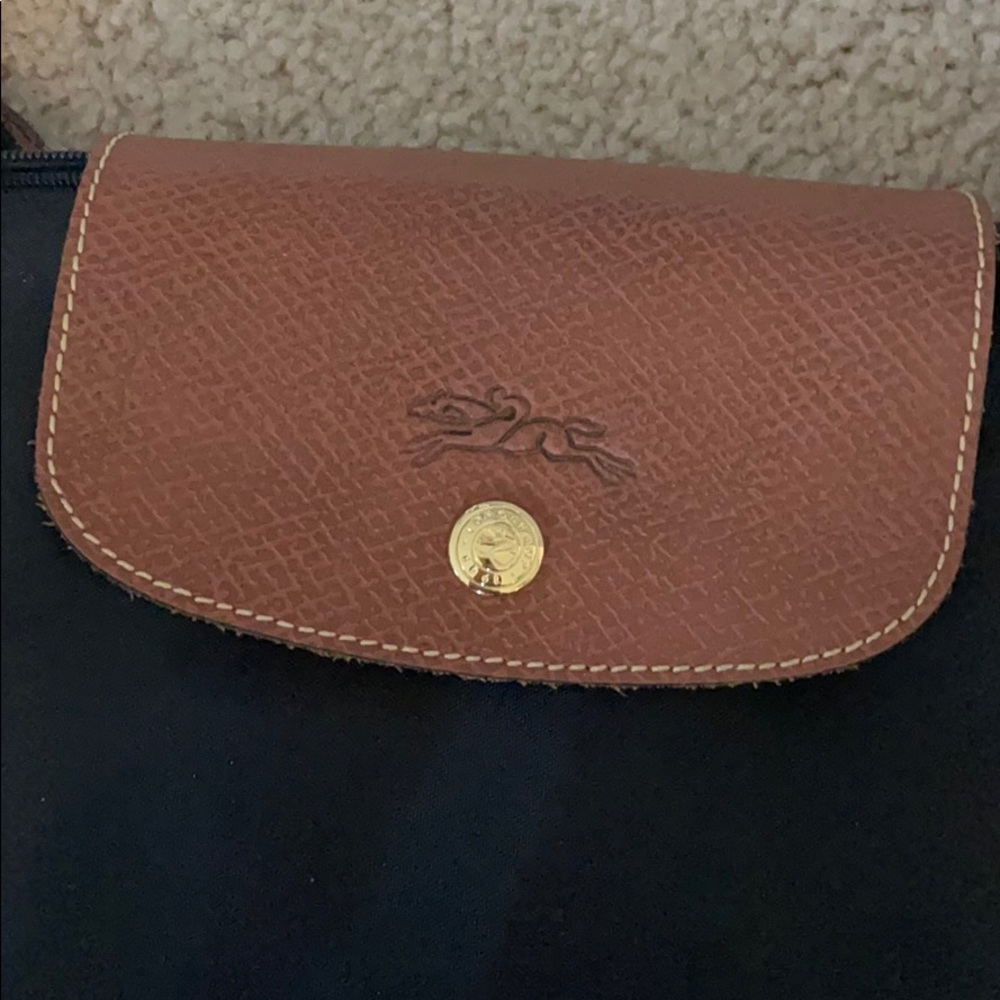 Black Longchamp bag.